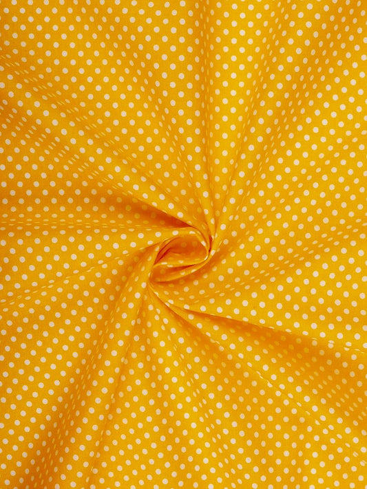 100% Kokvilnas audums - punktiņi(4 mm) uz sinepju dzeltena fona 125 g/m²