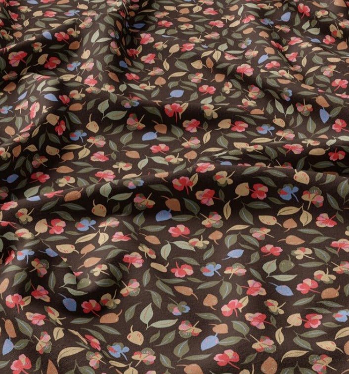 Image with 100% viscose fabric - delicate colored leaves 125 g/m² – available at Charlotte's Fabrics