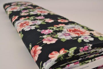 Image of 100% viscose fabric with flowers on black, 100 g/m² – available at Šarlotes audumi