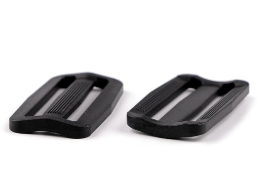 Plastmasas siksnu regulētājs (tri-glide) 50 mm (iepakojumā 5 gb)