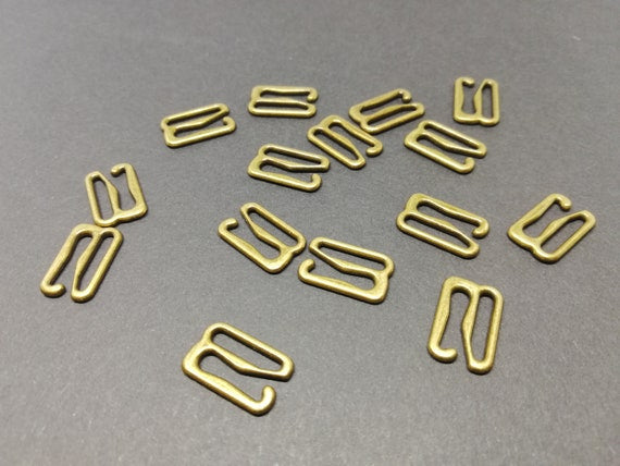 Metāla regulators-āķis veļai 12 mm-zelta (10 gb iepakojums)