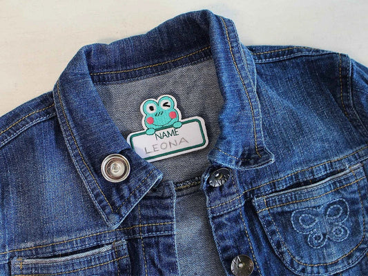 Attēls ar Auduma etiķete ar vārda vietu – uzlīmējama – pieejams Šarlotes audumi