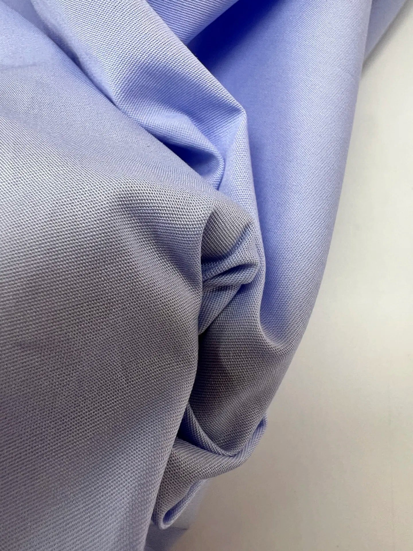 Itāļu okvilnas poplīns ar elastānu - zili lillā 100 g/m²