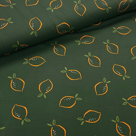 Kokvilnas cilpiņtrikotāža - citoni uz zaļa fona 225 g/m²