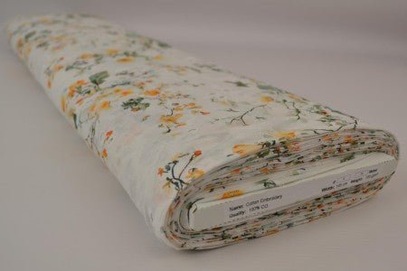 Attēls ar Kokvilnas izšuvuma audums ar ziedu rakstu 100g/m² – pieejams Šarlotes audumi