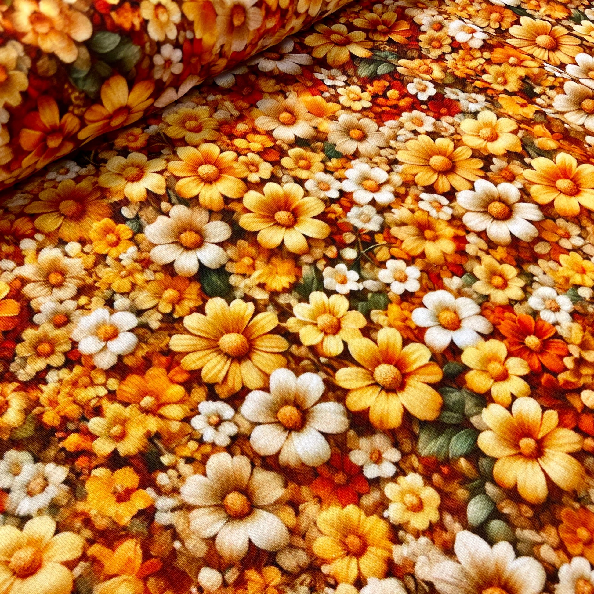 Kokvilnas trikotāža - dzelteni ziedi 200 g/m²