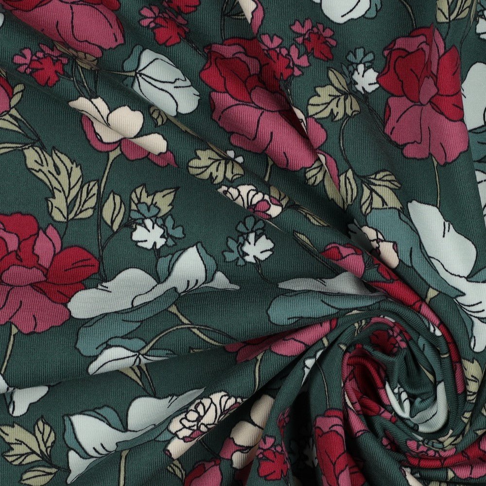 Kokvilnas trikotāža - puķes uz zaļa fona 200 g/m²