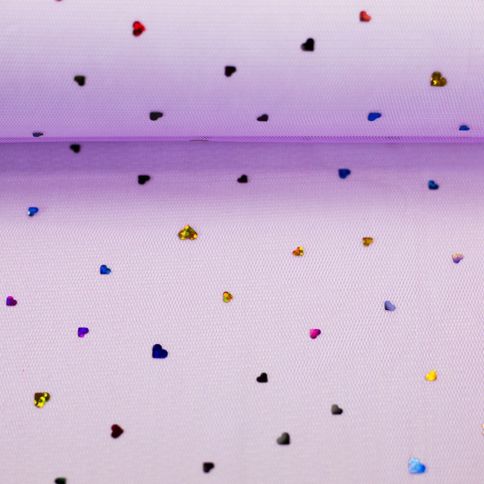 Attēls ar Mīksts tills ar sirsniņām uz lillā fona 40 g/m² – pieejams Šarlotes audumi