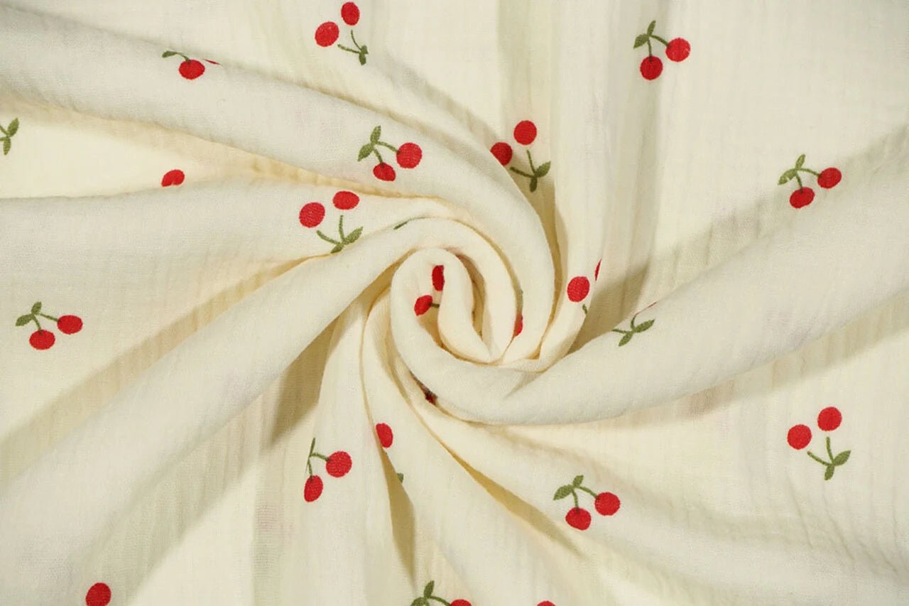 Muslīns - ķirši uz sviesta dzeltena fona 125 g/m²