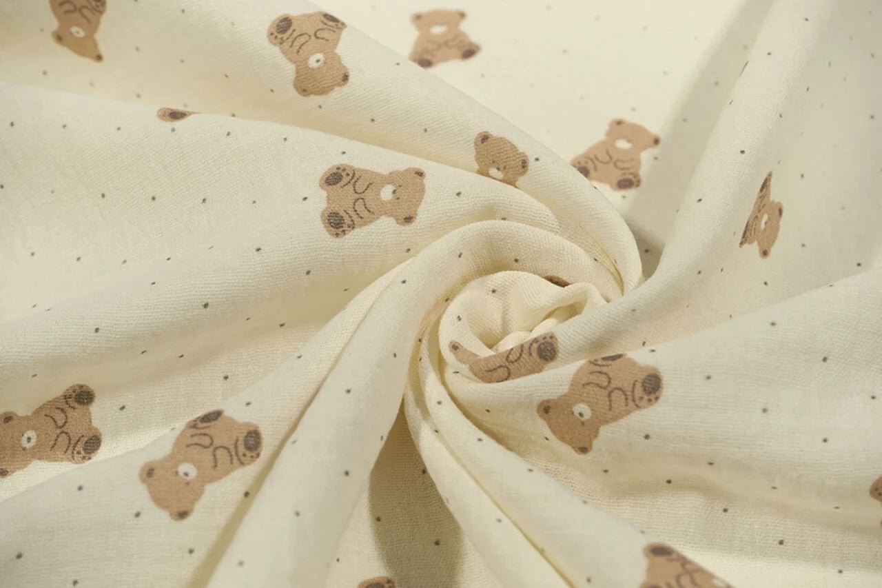 Muslīns - lācīši uz sviesta dzeltena fona 125 g/m²