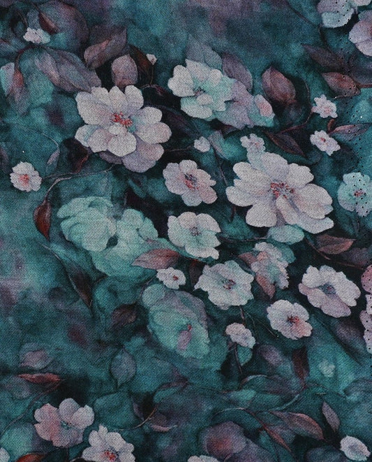 Attēls ar Punto di Roma trikotāžas audums - ziedi uz zilganzaļa fona 240 g/m² – pieejams Šarlotes audumi