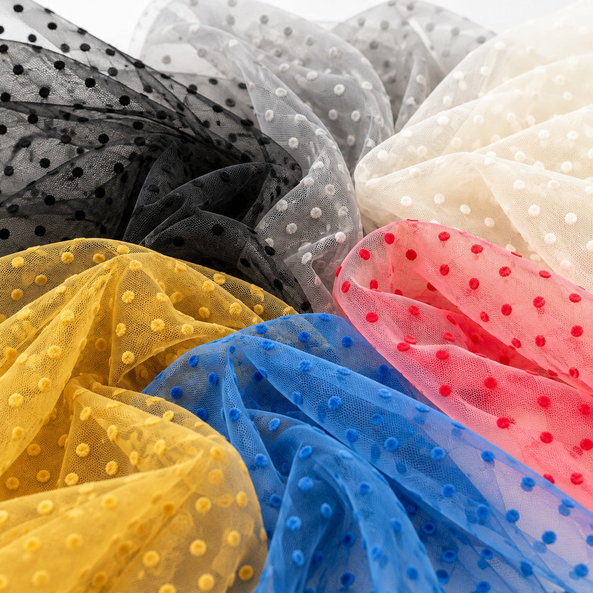 Tulle with pom-poms - Charlotte’s fabrics