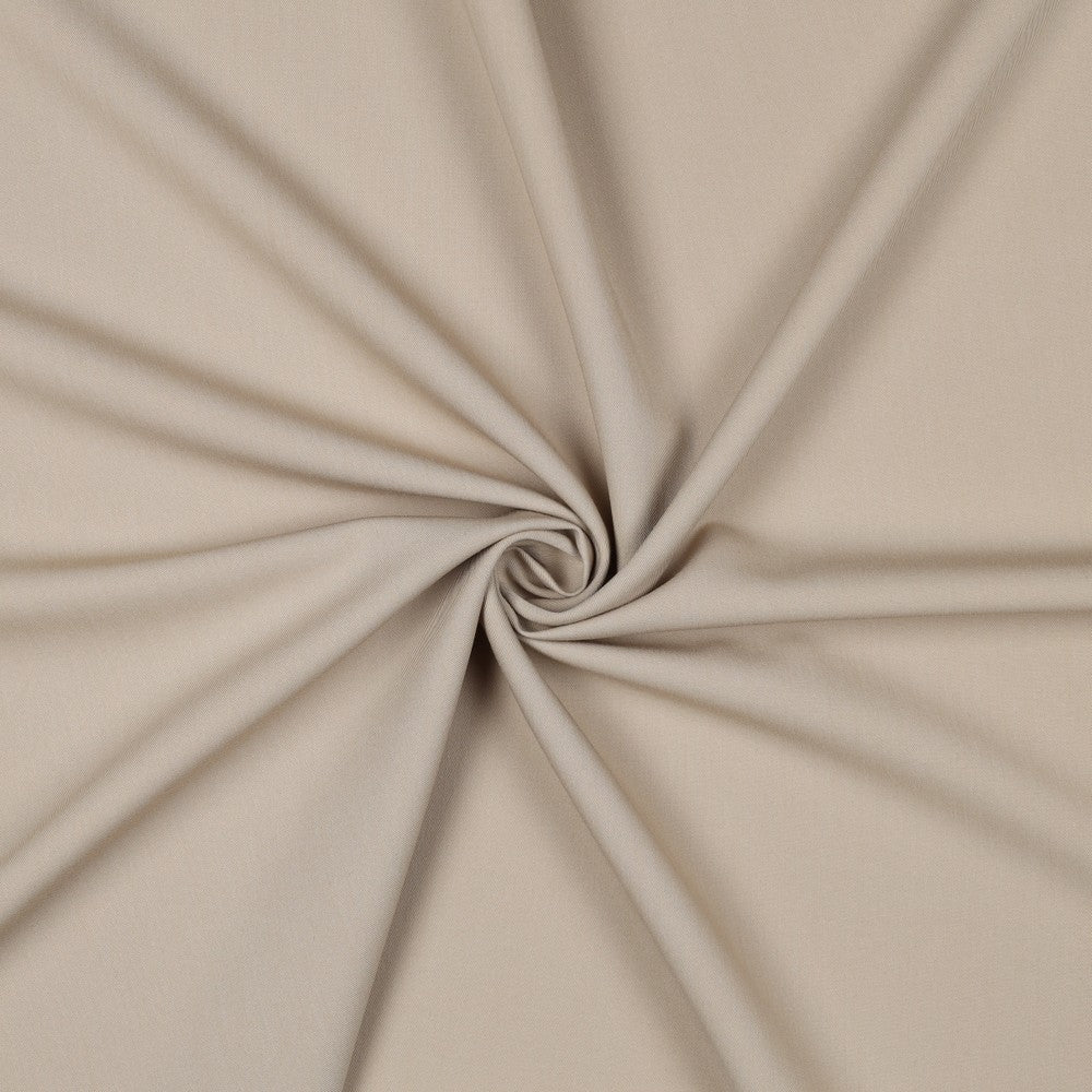 Kostīmaudums ar elastānu-bēšs 200 g/m²