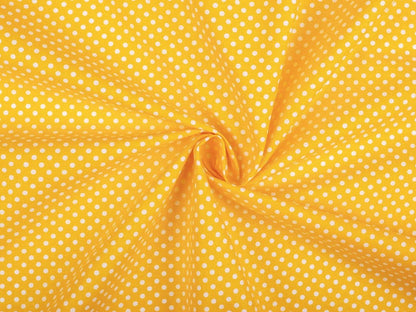 100% Kokvilnas audums - baltas pumpiņas uz dzeltena fona (4 mm) 130 g/m²