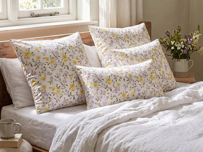 Image of 100% cotton fabric with yellow and lilac flowers – available online at Šarlotes audumi