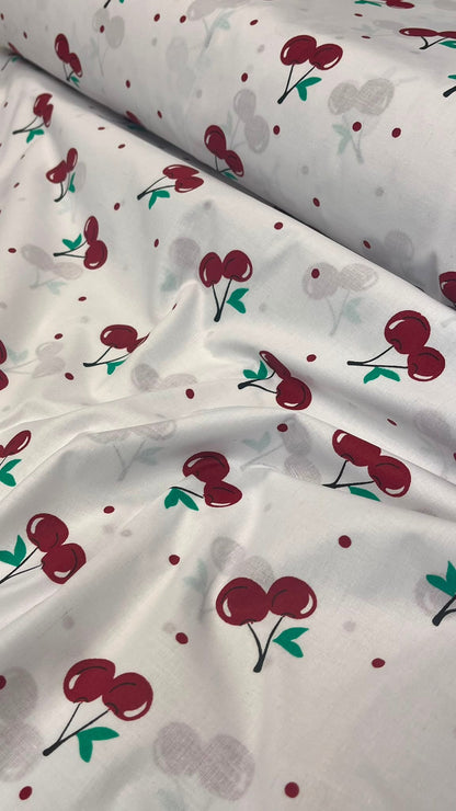Image of 100% cotton fabric - cherries, available online from Šarlotes audumi