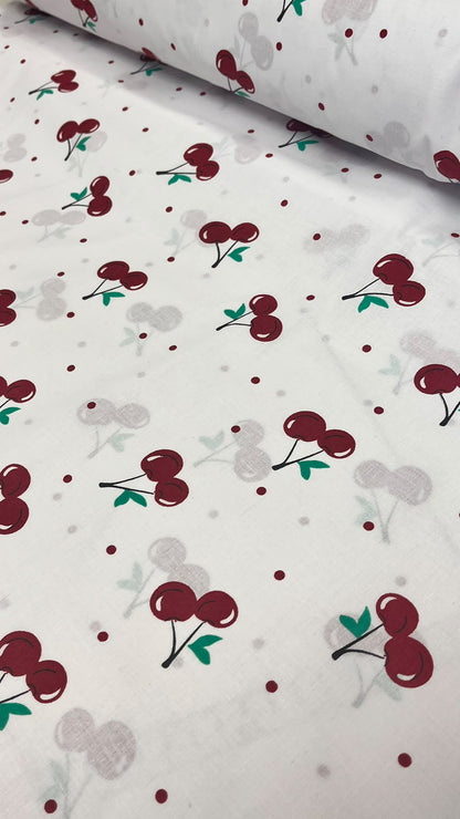 Image of 100% cotton cherry print fabric – available online at Šarlotes audumi