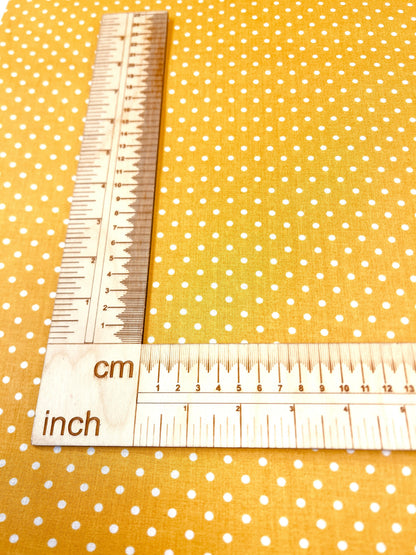 Tissu 100 % coton - pois (4 mm) sur fond jaune moutarde 125 g/m²