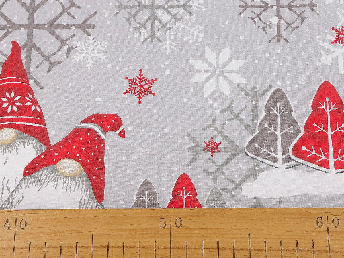 Image of 100% cotton fabric gnome with a blue hat – available online at Charlotte's Fabrics