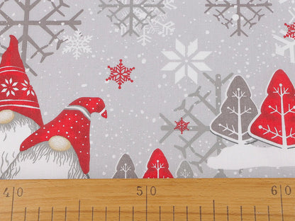Image of 100% cotton fabric gnome with a blue hat – available online at Charlotte's Fabrics