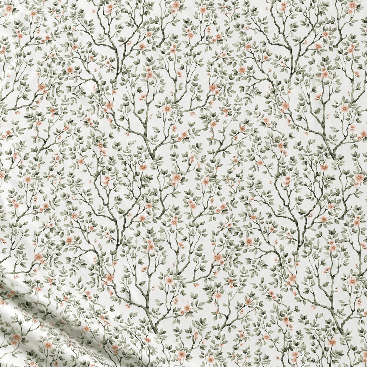 Image of 100% cotton fabric with delicate green branches and flowers on a white background – available online at Šarlotes audumi