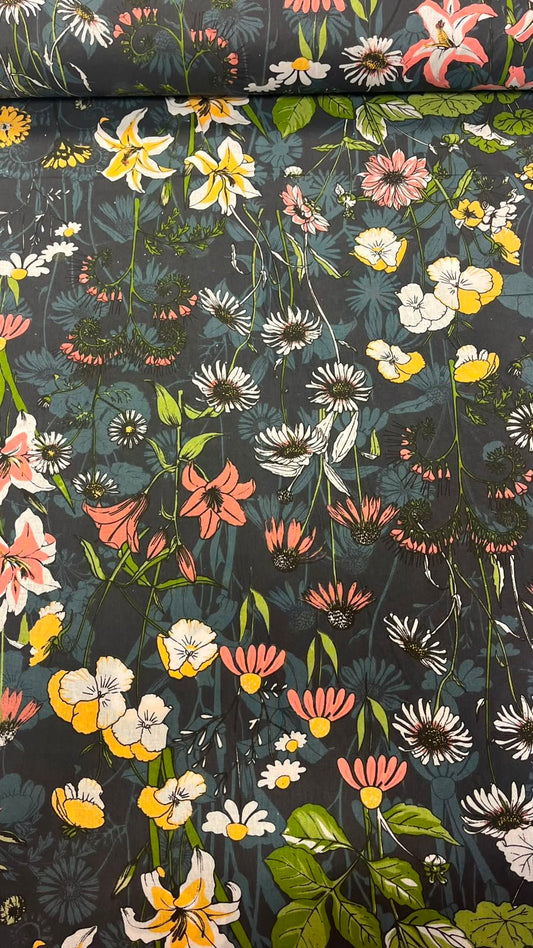 Image of 100% cotton fabric with flowers on a dark background – available online Charlotte's Fabrics