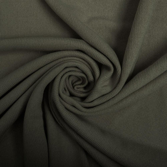 Attēls ar 100% kokvilnas smalks adījums - tumši zaļš 280 g/m² – pieejams Šarlotes audumi