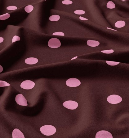 Image with 100% viscose fabric - pink circles on a burgundy background – available online at Šarlotes audumi