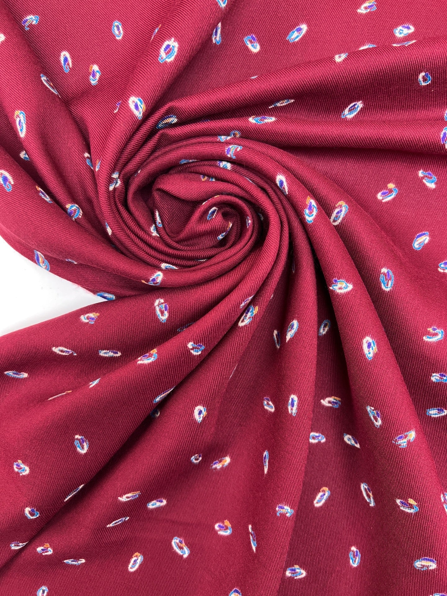 Italian twill fabric in burgundy with a subtle pattern 125 g/m²