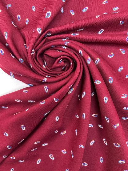 Italian twill fabric in burgundy with a subtle pattern 125 g/m²