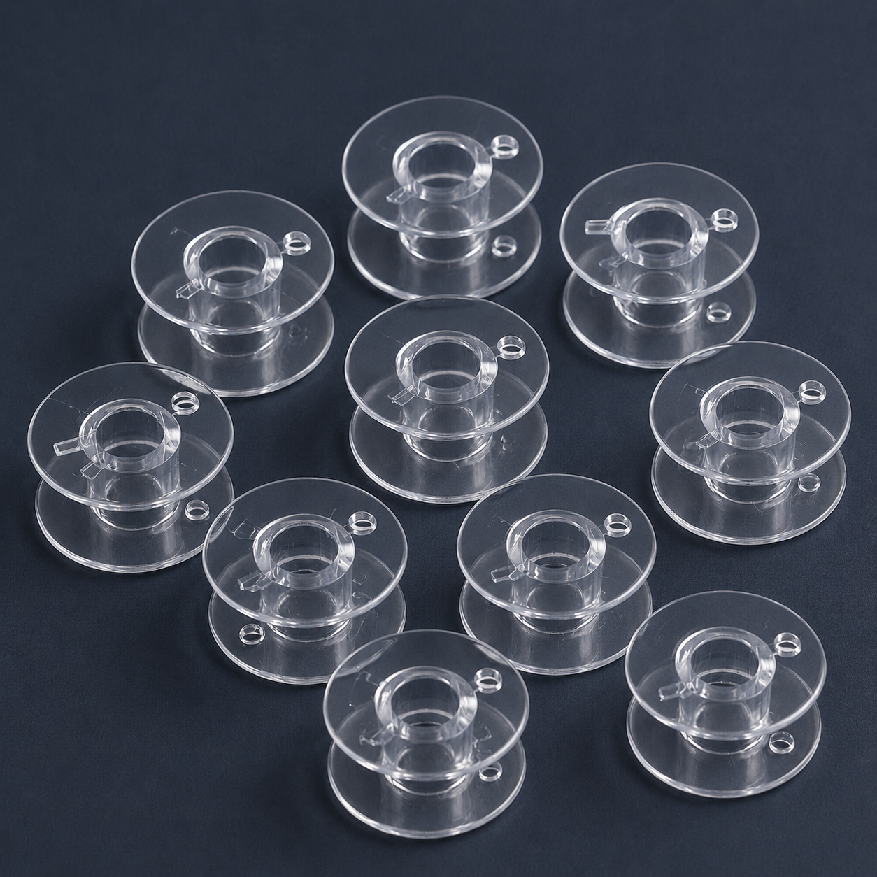 Plastmasas spolīte plakana šujmašīnām Ø 20,4 mm-komplekts 10 gab.