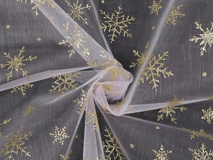 Image of white organza with gold sparkling snowflakes – available online at Šarlotes audumi