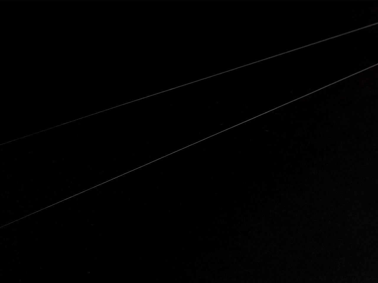Image of transparent nylon monofilament sewing thread – 0.1 mm × 6000 m – available online at Šarlotes audumi