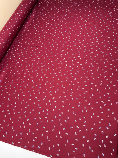 Italian twill fabric in burgundy with a subtle pattern 125 g/m²