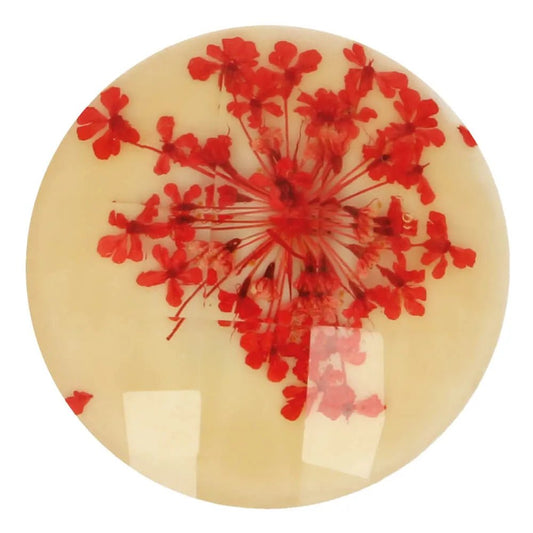 Image of a decorative button with a real dried flower in resin, 25 mm, red flower – available online at Šarlotes audumi