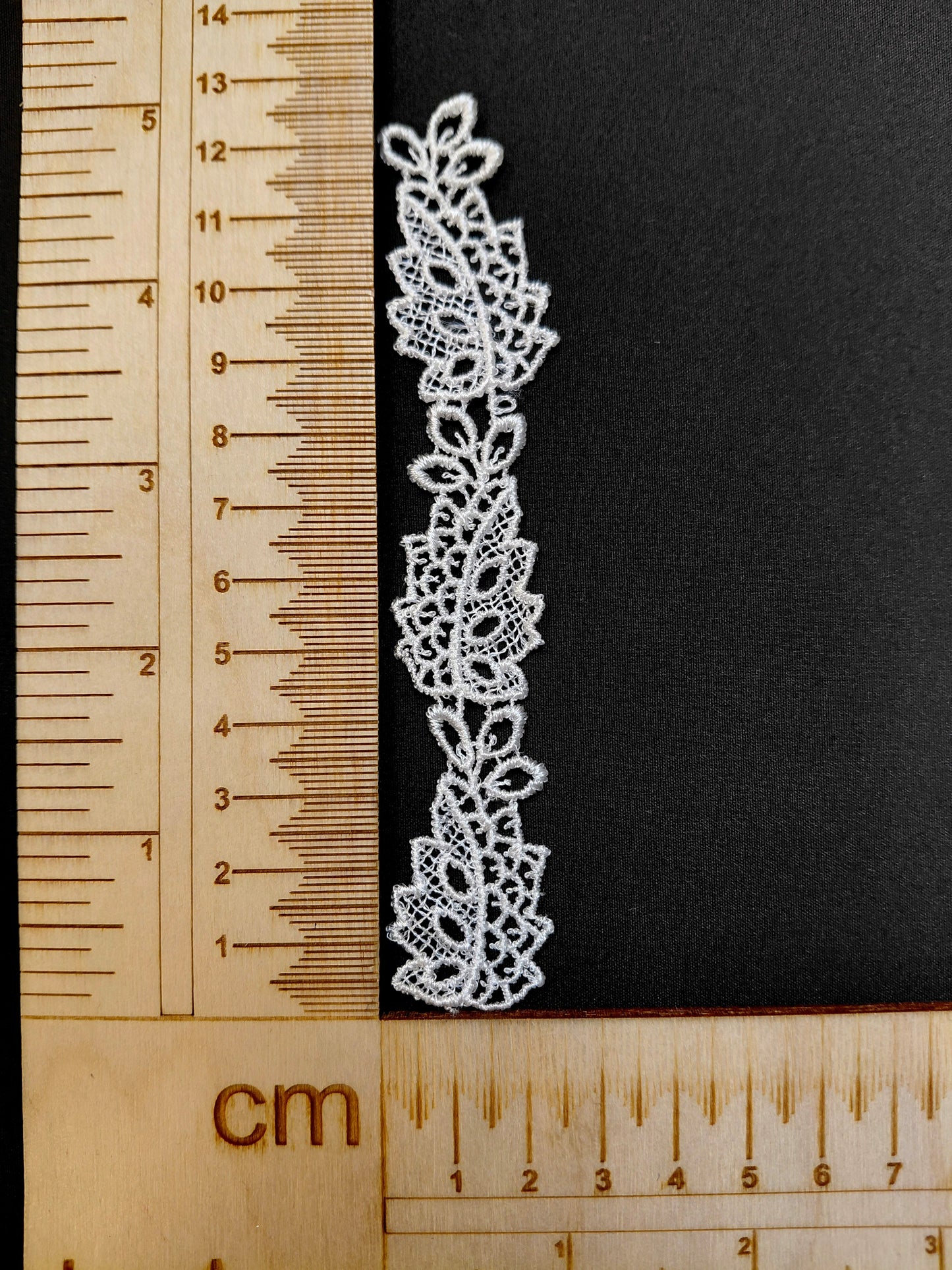 Attēls ar Ielāps/uzšuve 12,5 x 2,5 cm – pieejams Šarlotes audumi