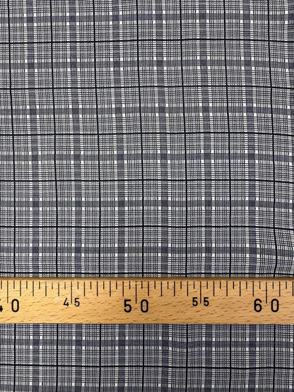 Image d'un tissu italien 100 % coton gris à motif à carreaux, d'épaisseur moyenne pour vêtements, 195 g/m² – disponible chez Charlotte Tissus