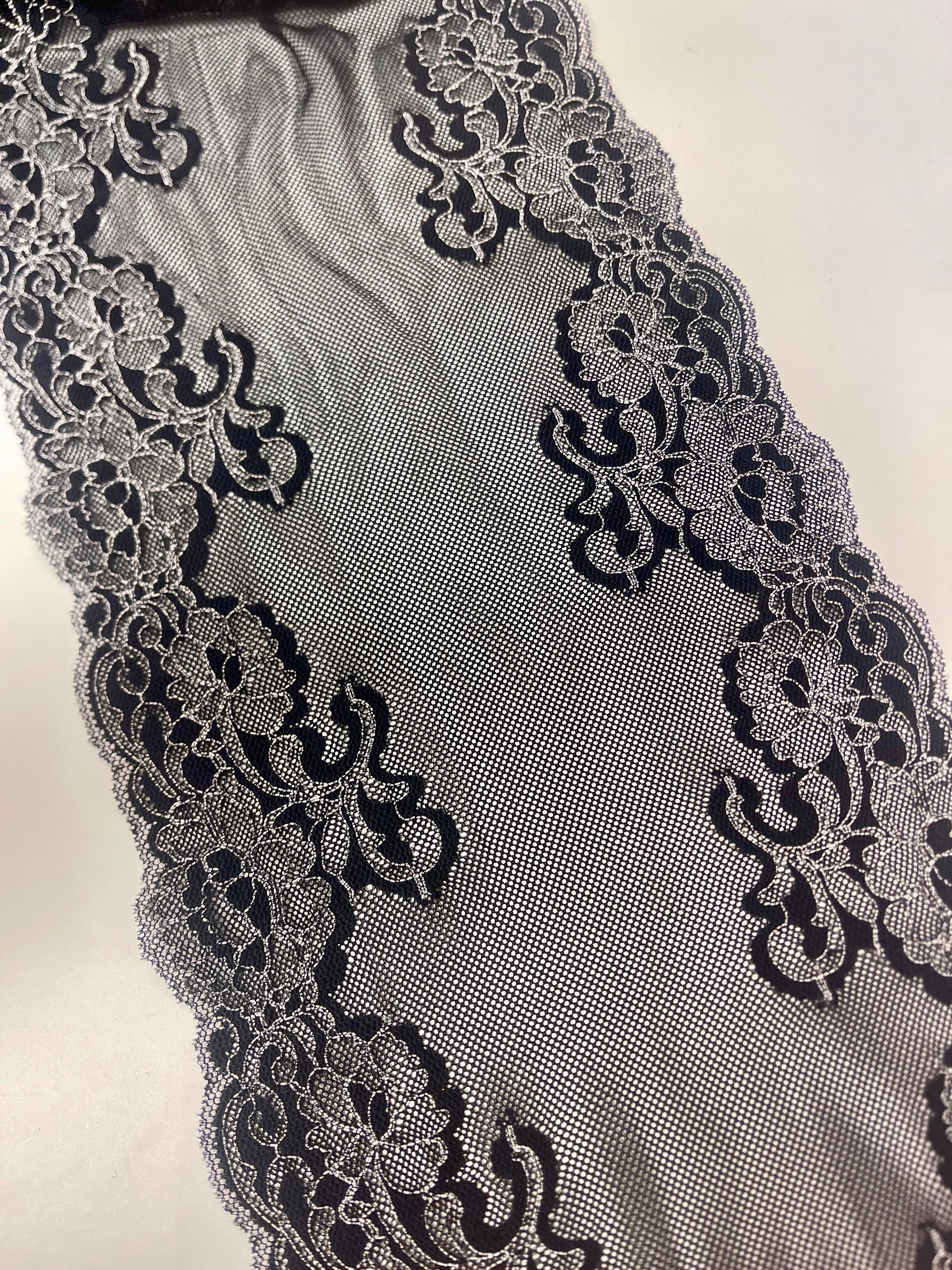 Embroidered lace on mesh, 20 cm, black with white – available online at Šarlotes audumi