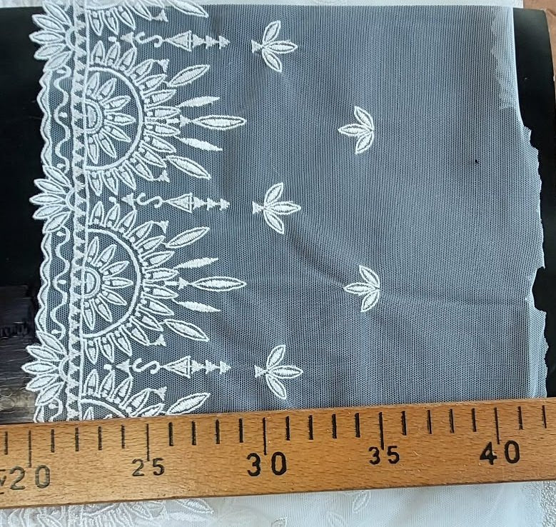 Image of embroidered lace on tulle, 20 cm, porcelain white – available online at Šarlotes audumi