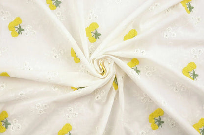 Tissu en coton brodé - fleurs jaunes 110 g/m²