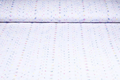 Tissu en coton brodé - broderie colorée 110 g/m²