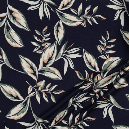 Tissu canvas - feuilles sur fond bleu foncé 225 g/m²