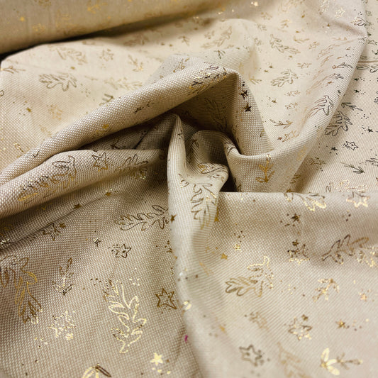 Attēls ar Kanvas audums - zelta lapiņas uz gaiša fona 175 g/m² – pieejams Šarlotes audumi