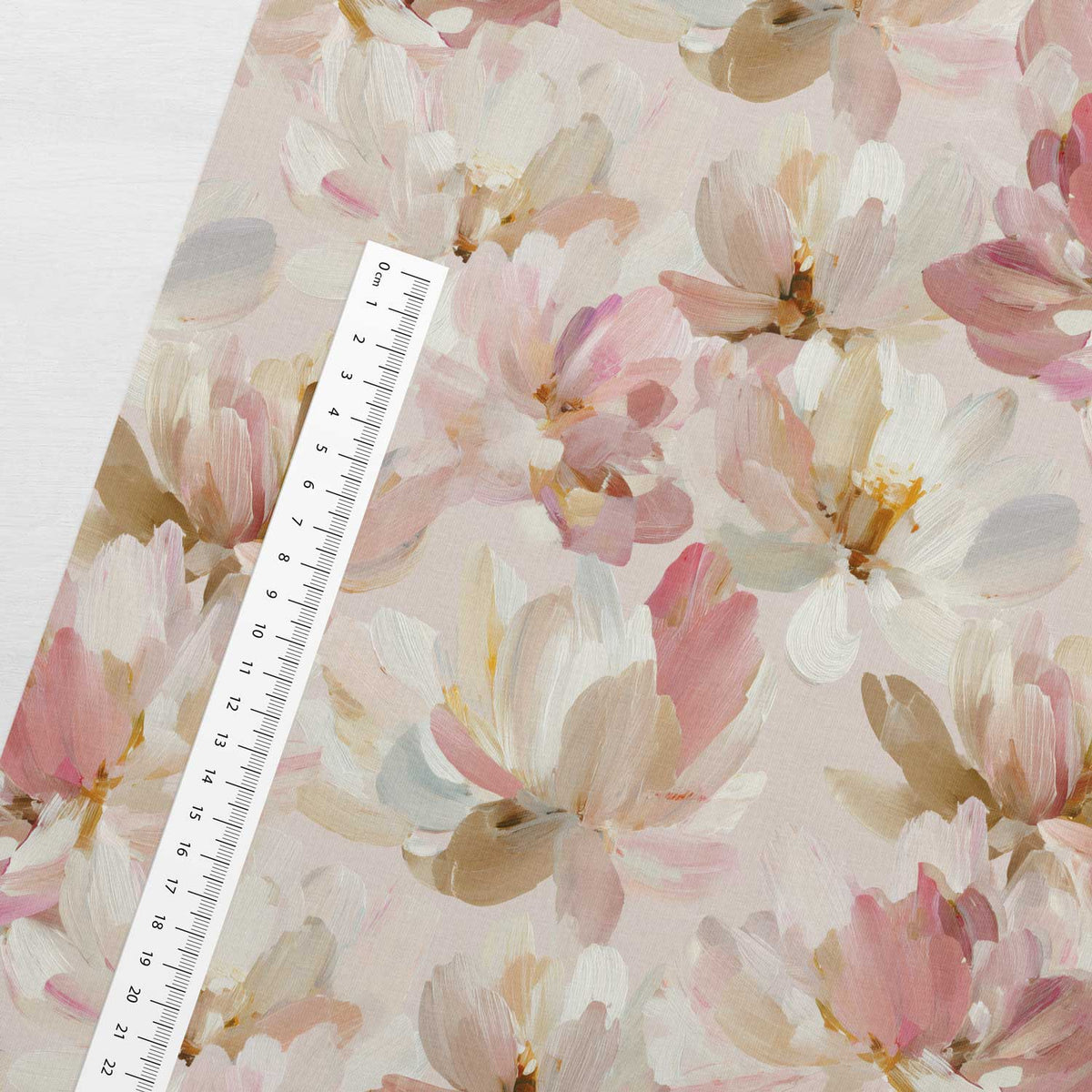 Cotton loopback knit image with painted magnolias in pastel tones – available online at Charlotte's Fabrics