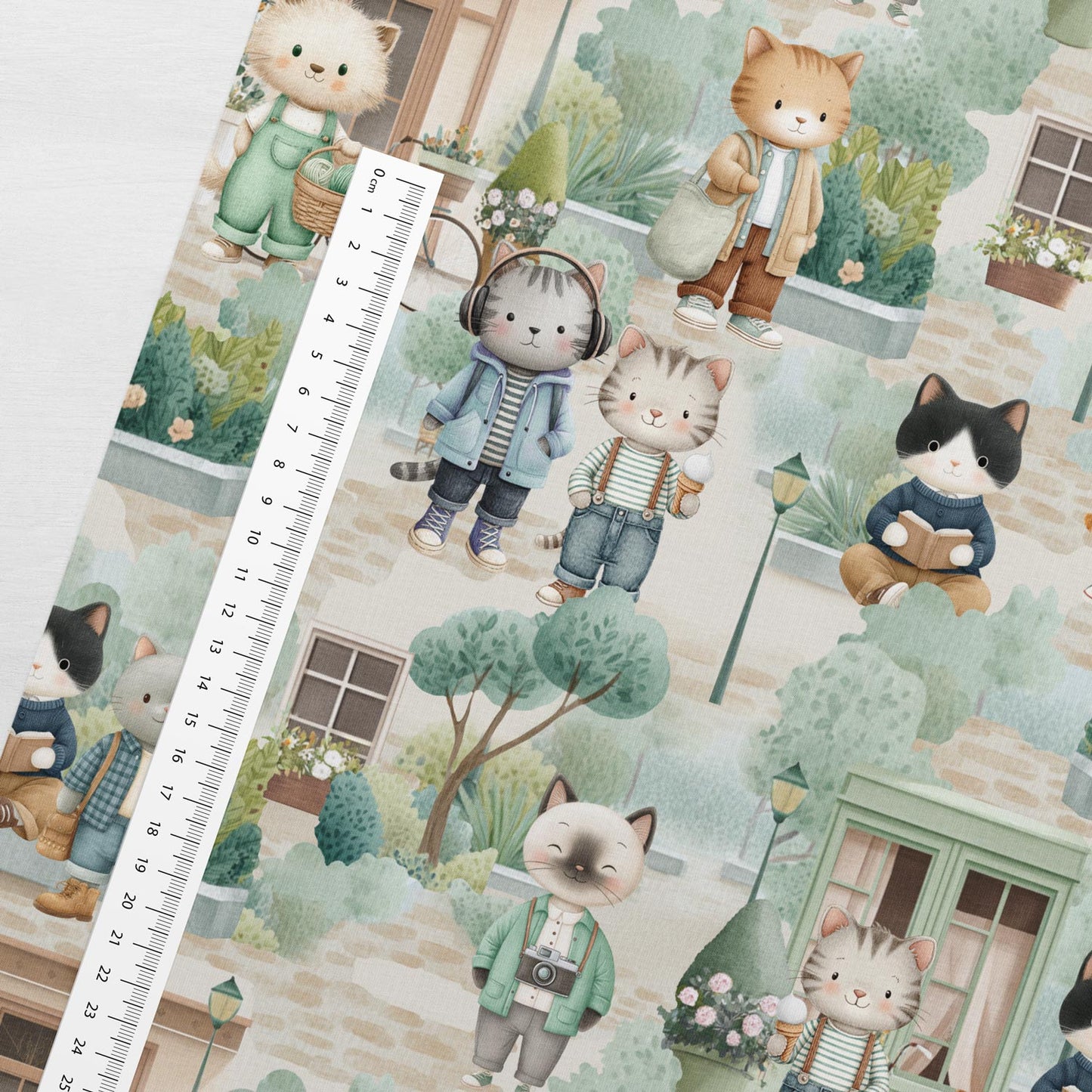 Image avec tricot bouclé en coton - vie de chat en ville 250 g/m² – disponible chez Tissus Charlotte