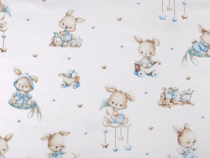 Image of cotton flannel with rabbits in blue accents – available online at Šarlotes audumi