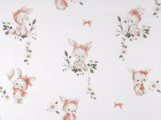 Image of cotton flannel with bunnies in pink bows – 100% cotton – available online at Šarlotes audumi