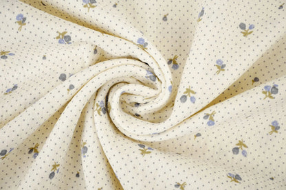 Cotton muslin with tiny flowers and dots - available online at Charlotte Fabrics