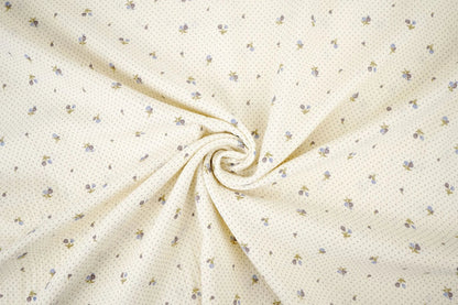 Cotton muslin with tiny flowers and dots - available online at Charlotte Fabrics