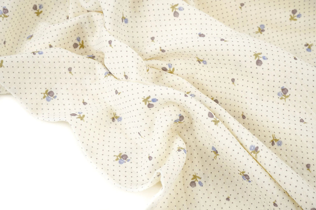 Cotton muslin with tiny flowers and dots - available online at Charlotte Fabrics